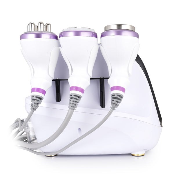 White and purple electronic device with multiple attachments on a white background