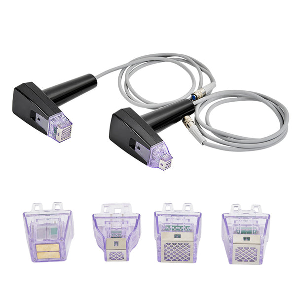 Two black electronic devices with cables and four purple plastic containers on a white background