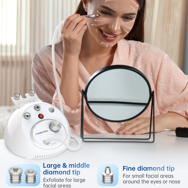 Woman using a facial exfoliation device with a mirror and product details on a table.