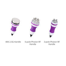 Three purple and white handles labeled '40K 2.5G Handle', '6-pole Photon RF Handle', and '3-pole Photon RF Handle' on a white background.