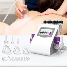 Person receiving a cosmetic treatment using a machine with various attachments on a table.