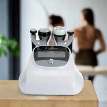 Beauty device on a table with blurred people in the background