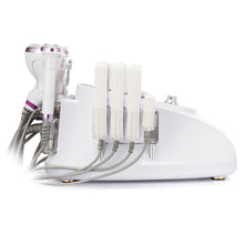 White electronic device with multiple attachments on a white background