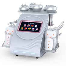 A professional ultrasonic cavitation RF vacuum machine designed for body sculpting and cellulite dissolving, with multiple handles and a digital display.