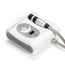 White electronic device with control panel and cable on a white background