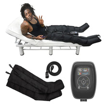 Person lying on a massage table with black massage boots and control panel on a white background