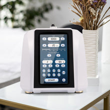 Digital device with a screen on a table with a blurred background