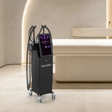 A professional lipo laser machine with a black console and multiple attached black treatment arms, shown in a modern beige spa-like interior next to a treatment table.
