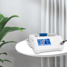 Medical device with digital display on a white table next to a plant
